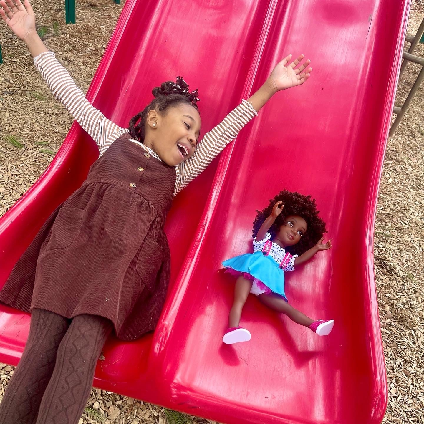 Beautiful Curly Me Bella 18-inch doll with natural curly hair